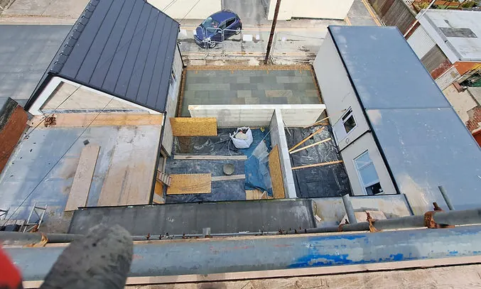Total Building North West working on a commercial building